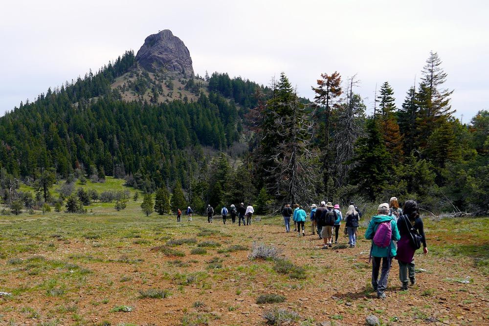 hikers on trail to Pilot Rock